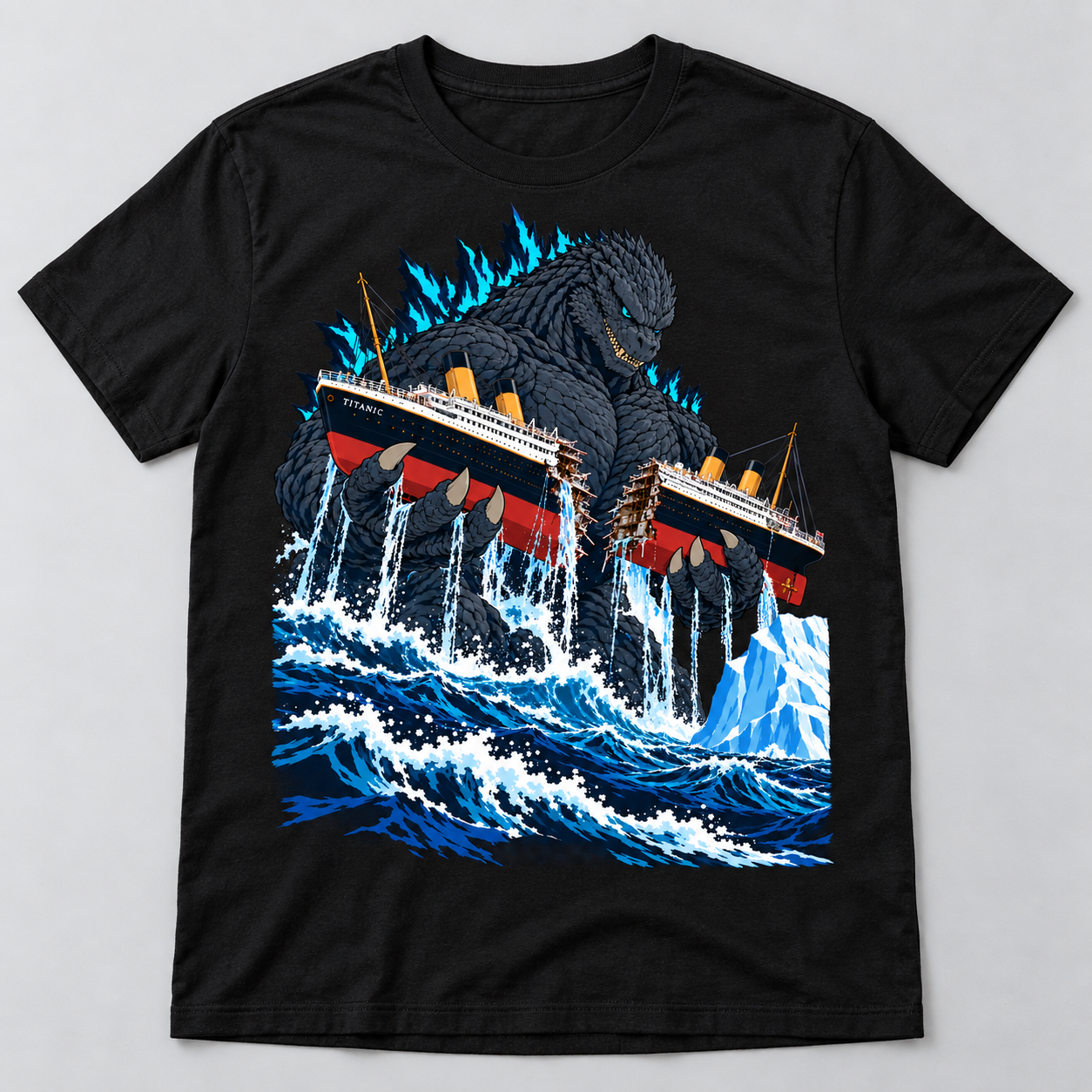 Black T-shirt graphic showing giant blue-spined sea creature gripping a broken ocean liner over roaring waves and an iceberg