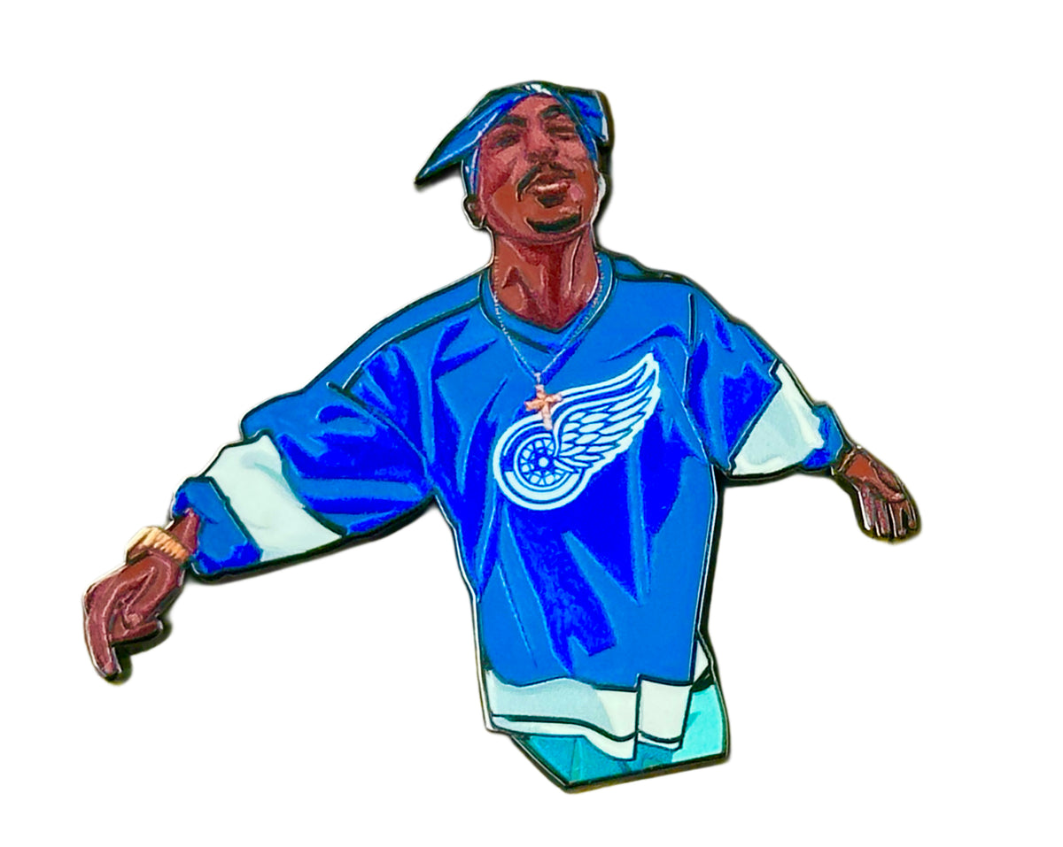 Tupac in Blue Jersey Iconic Spitting Moment Enamel Pin – A Powerful Tribute to a Legend