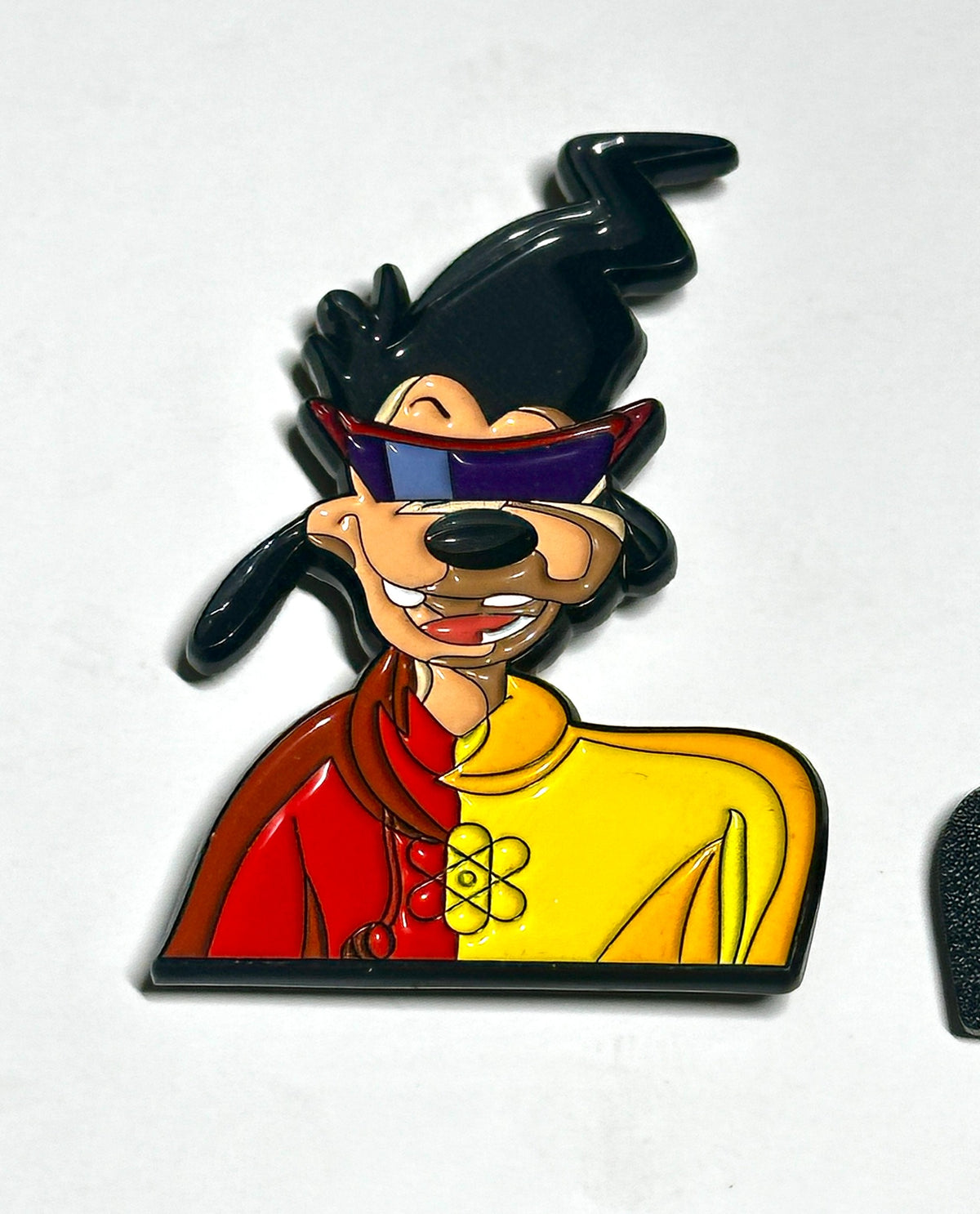 colorful 90s cartoon music mashup enamel pin angled view