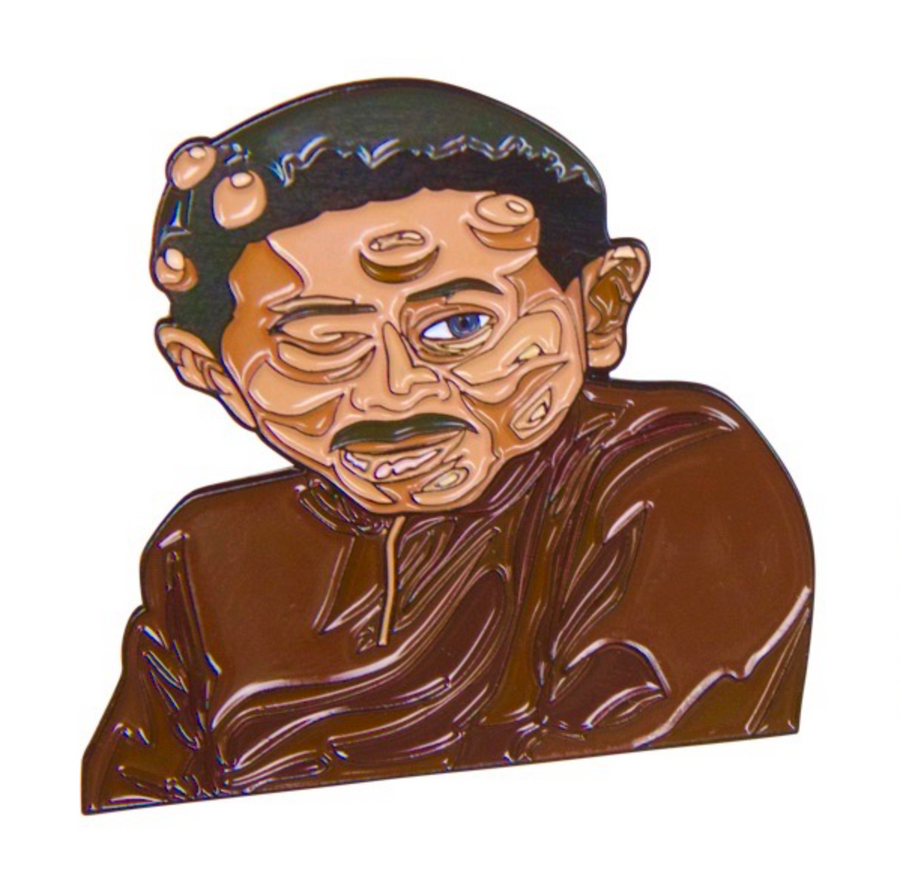 Collectible enamel lapel pin featuring an original boxing humorous retro design
