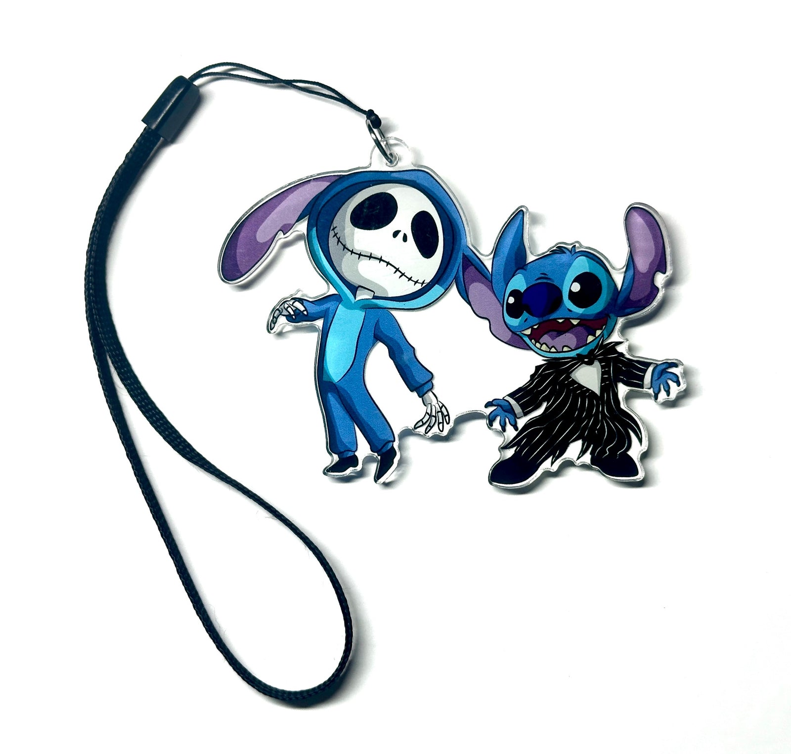 Blue alien and skeleton-costume duo acrylic wrist strap keychain on white background, front product photo