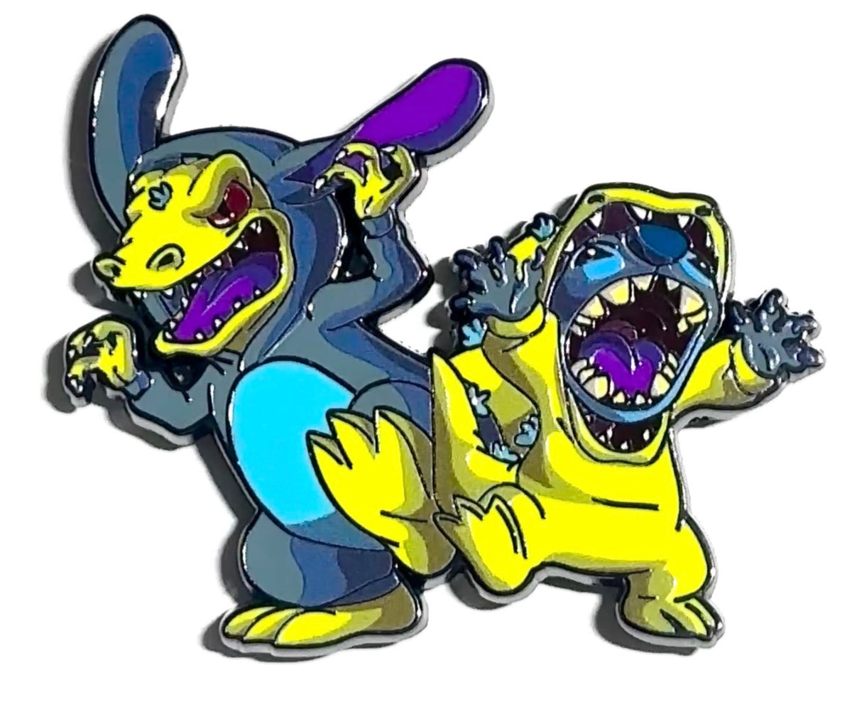 Blue alien and roaring dinosaur reptile costume duo enamel pin