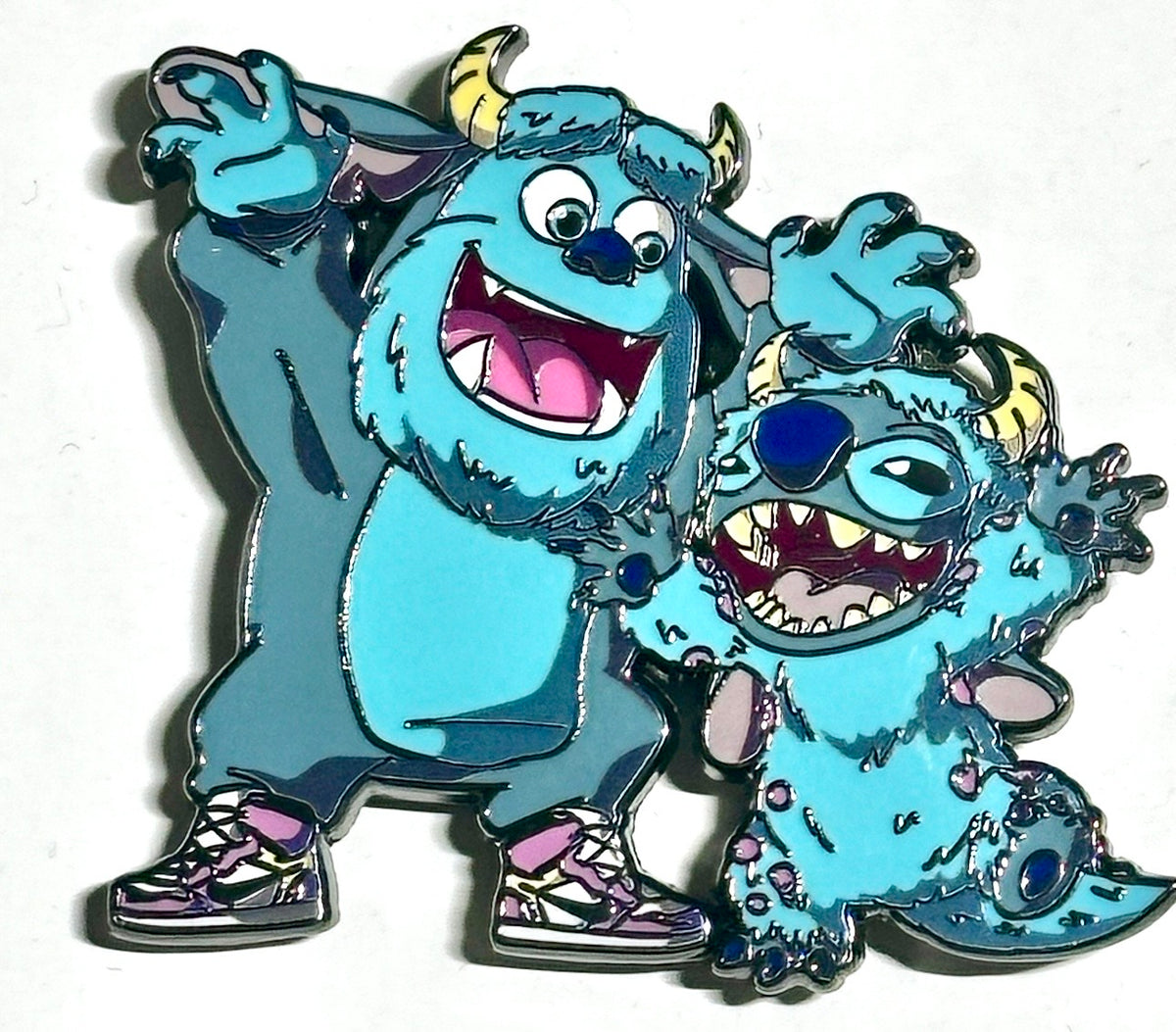 Blue alien and horned furry monster best friends enamel pin