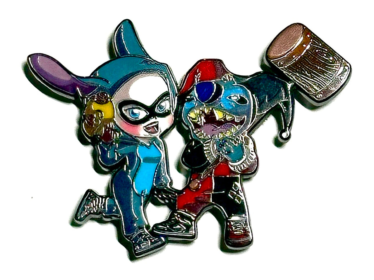 Blue alien jester and masked mallet character duo enamel pin
