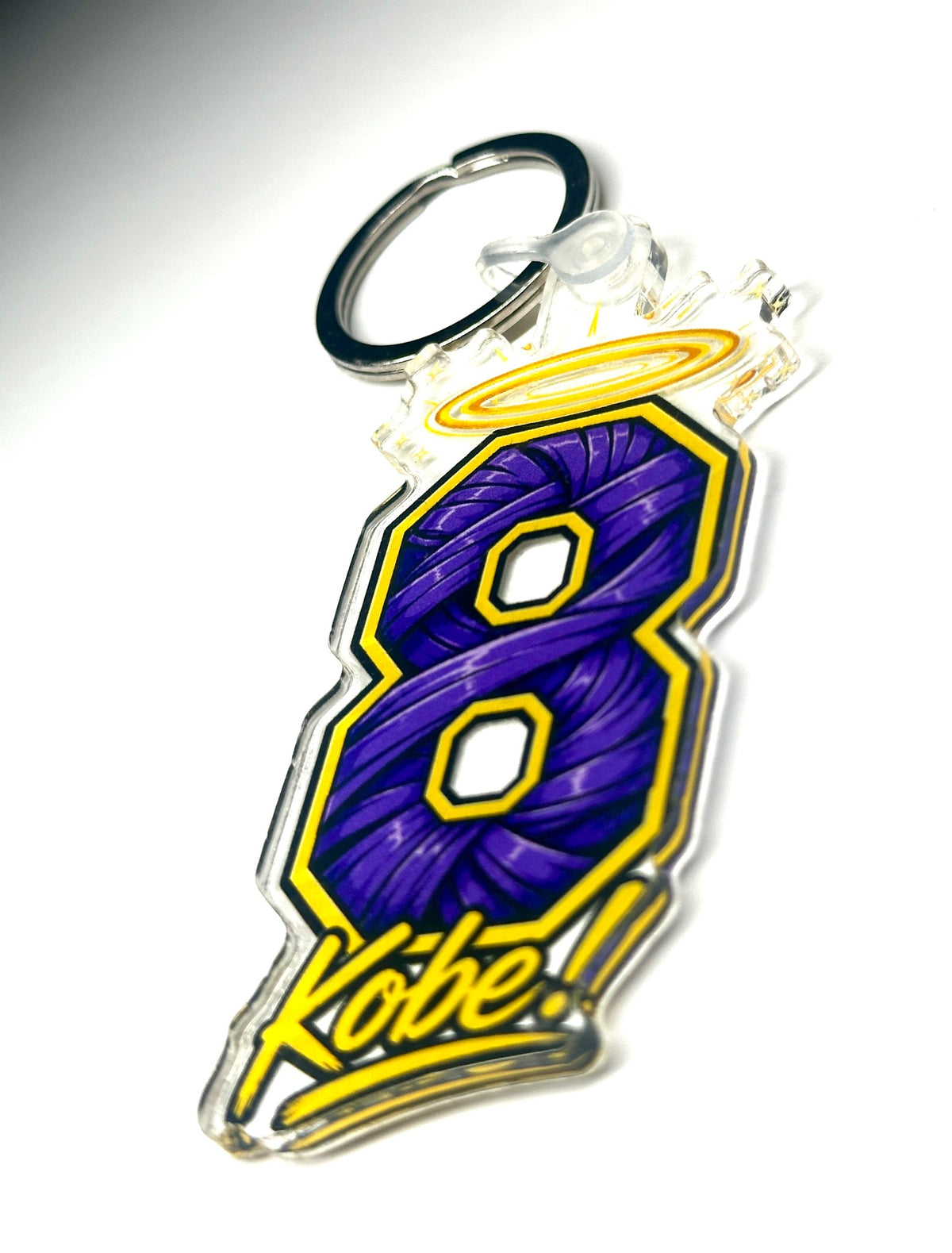 Purple and gold number 8 basketball tribute acrylic keychain with halo and script lettering, angled product photo