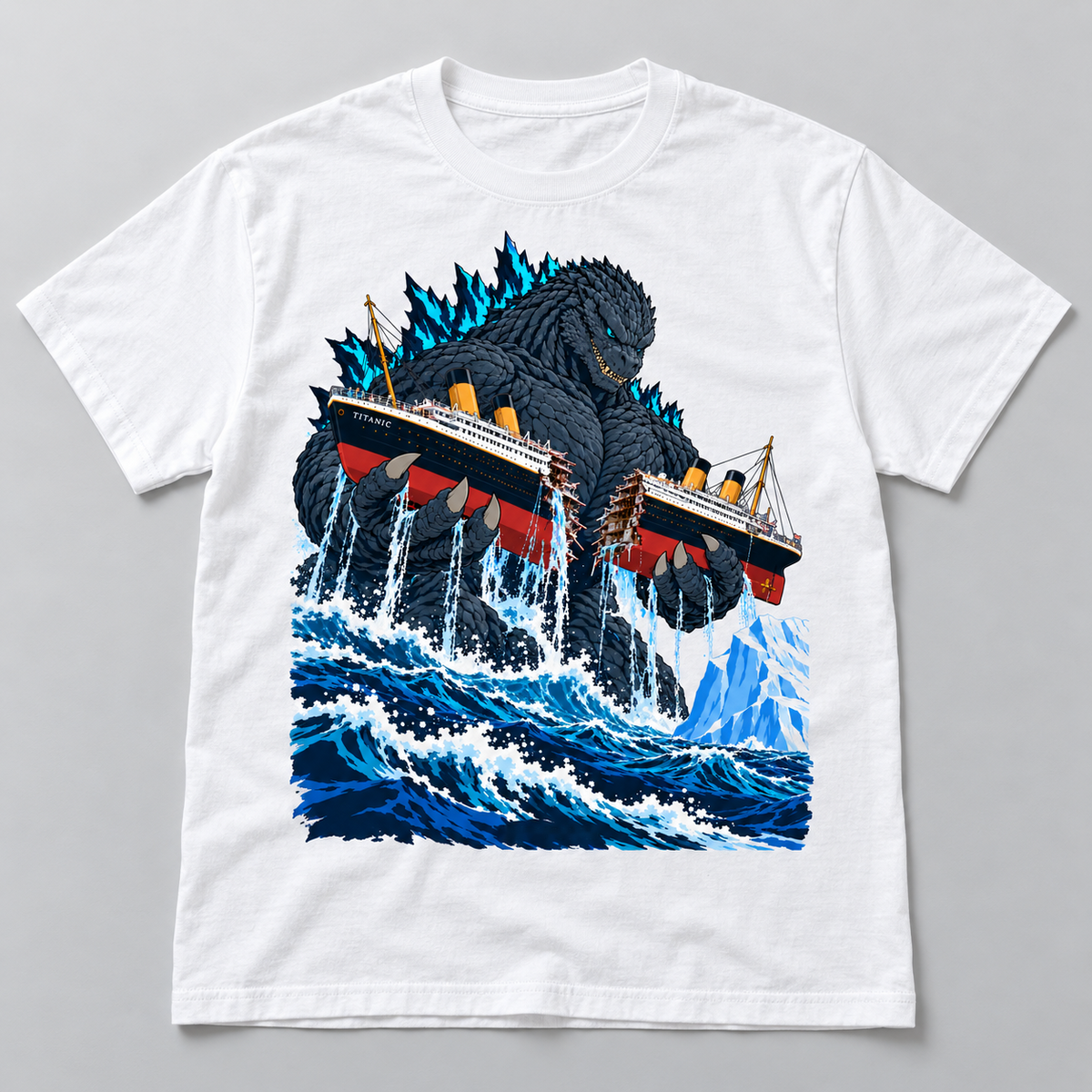 White T-shirt with blue-spined giant ocean monster holding a split passenger liner above stormy waves and an iceberg