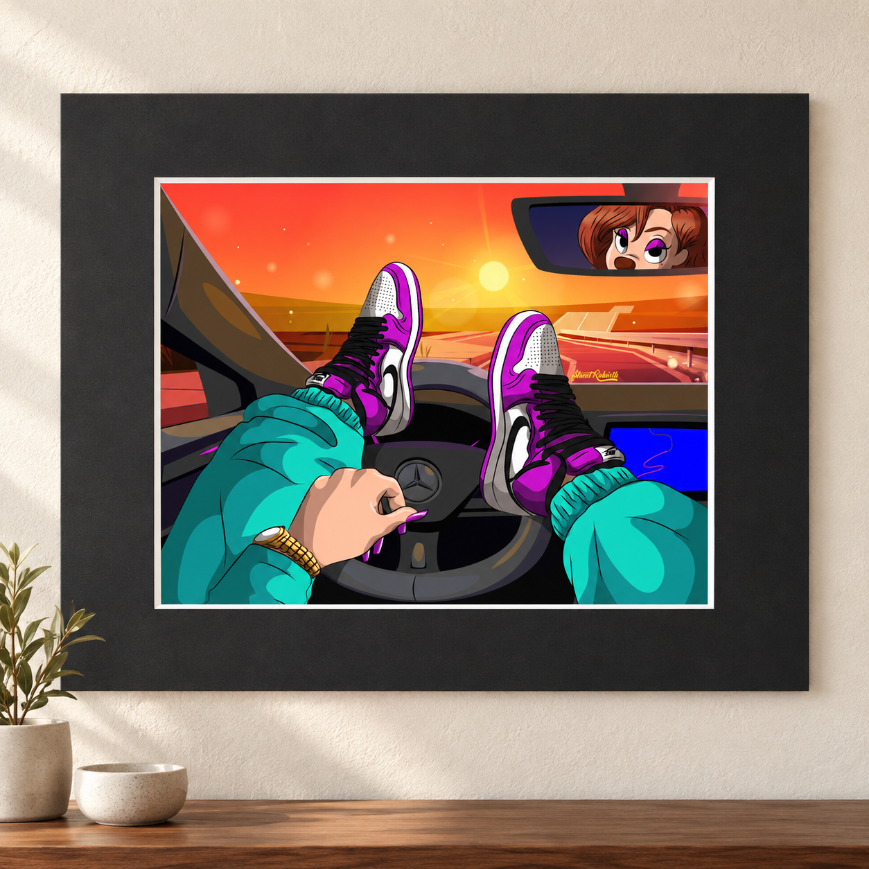 Sunset drive cartoon wall art in black matte border frame above wood console