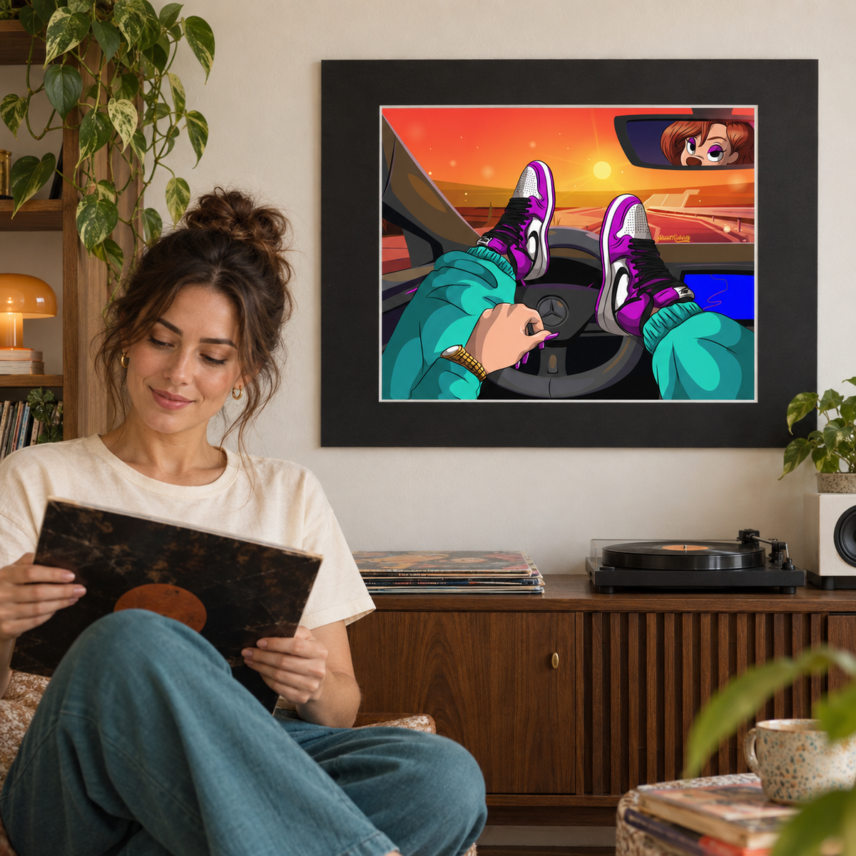 Sunset drive cartoon wall art above record console in cozy listening room with seated vinyl collector