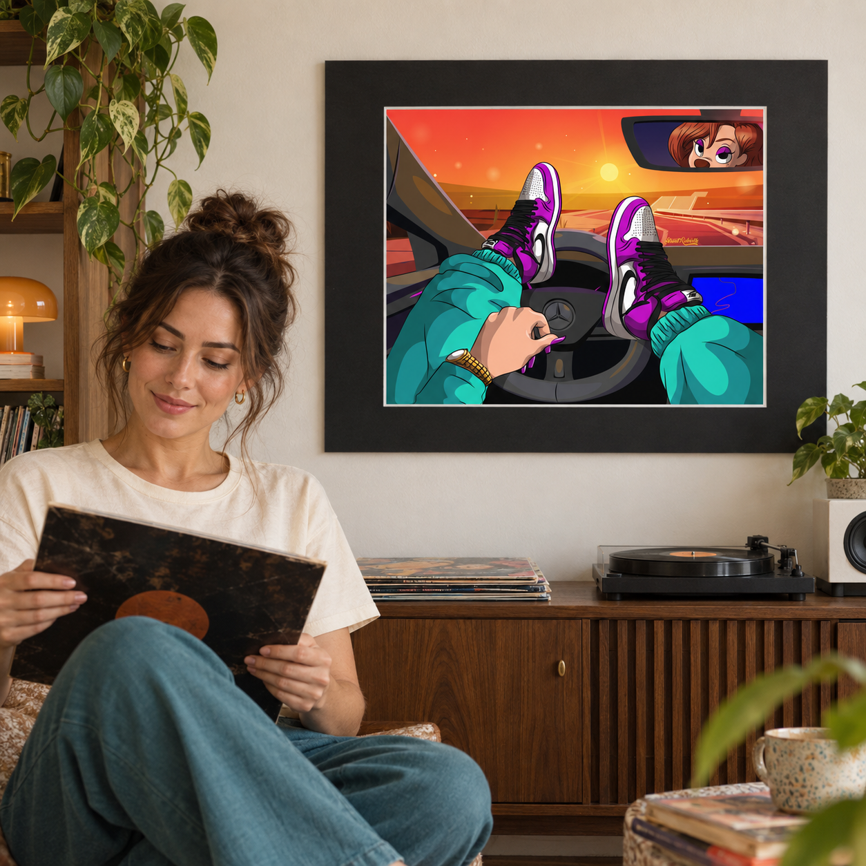 Sunset drive cartoon wall art above record console in cozy listening room with seated vinyl collector
