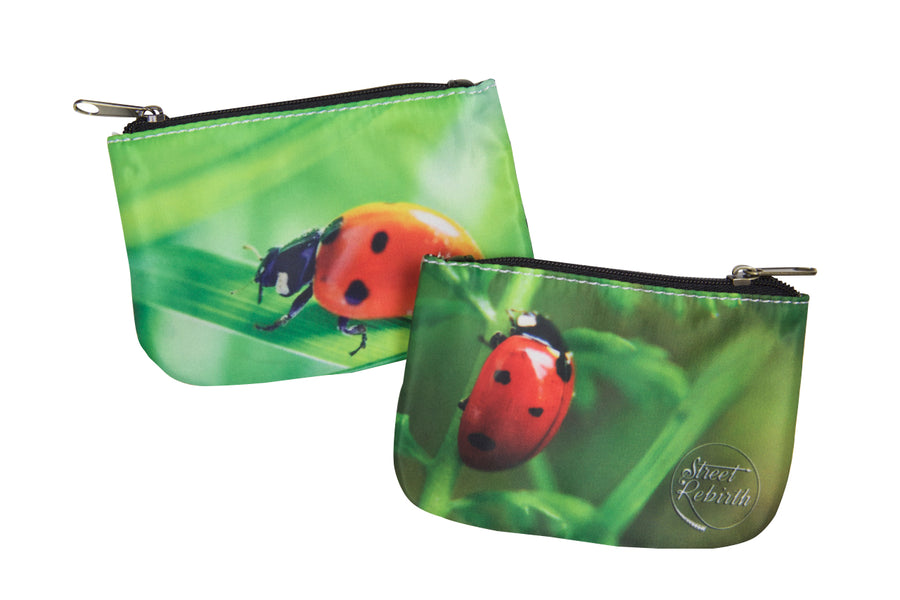 Compact coin purse with an original humorous printed design
