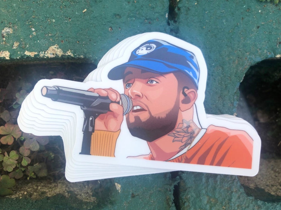 Hip hop rapper on the mic portrait sticker in a blue cap and orange shirt