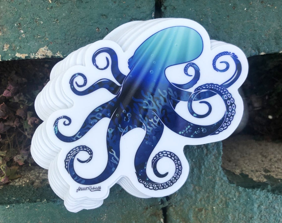 Abstract octopus silhouette sticker with an ocean scene inside the shape