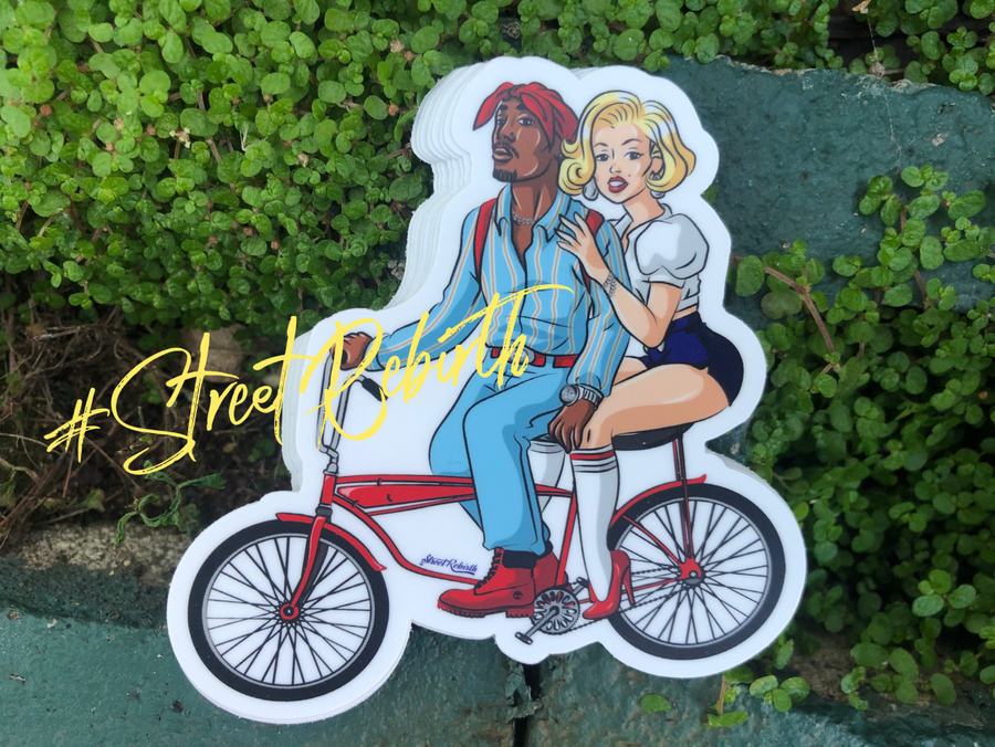 Icon mashup sticker of a rap legend and a blonde bombshell riding a classic bike